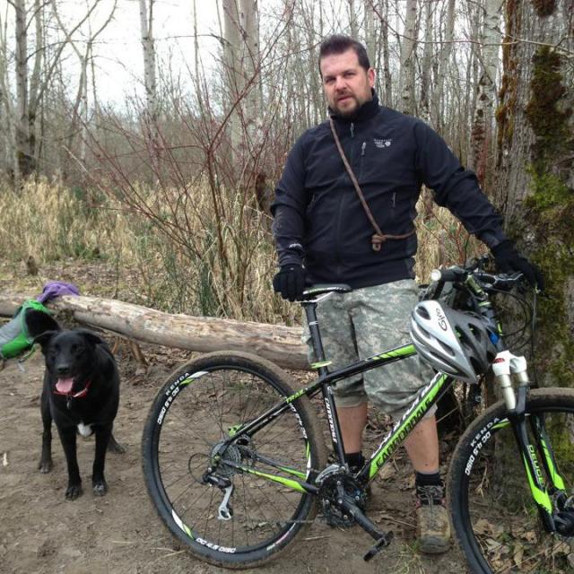 Dan with dog and bike