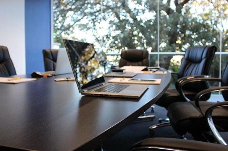 board chairs with laptop
