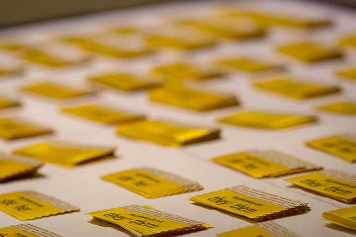 A table with pronoun ribbons displayed.