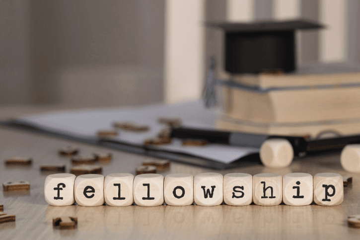 "Fellowship" spelled out in lettered dice.