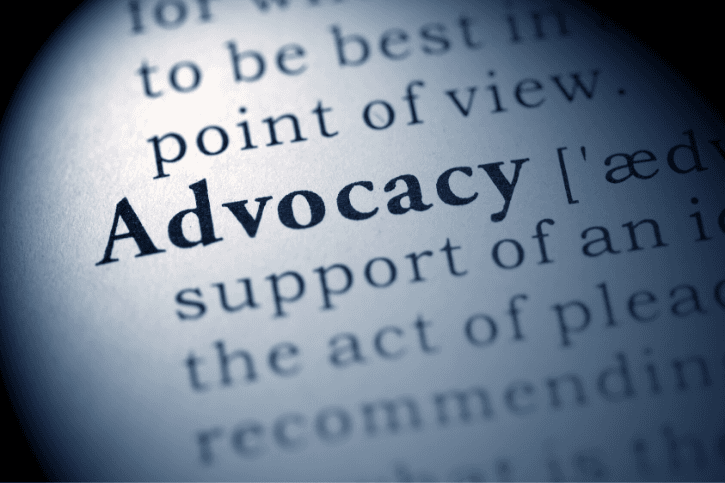 Closeup of "Advocacy" in a dictionary