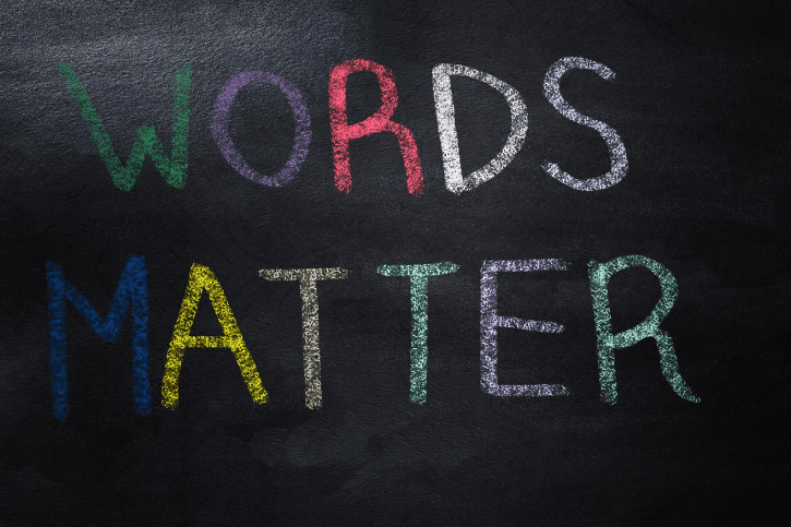 WORDS MATTER with each letter written in a different color and on a black background