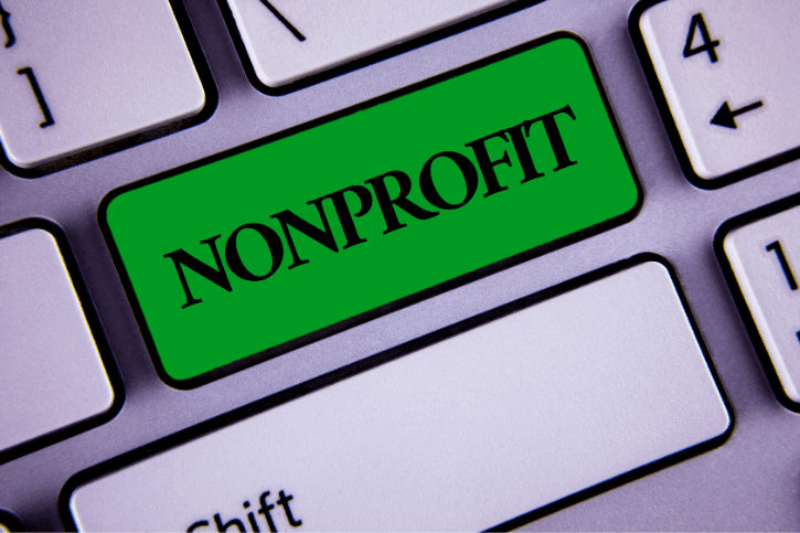 "Nonprofit" on a green button on a computer keyboard